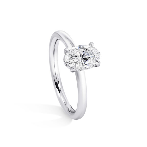 18ct white gold oval cut diamond solitaire four claw ring