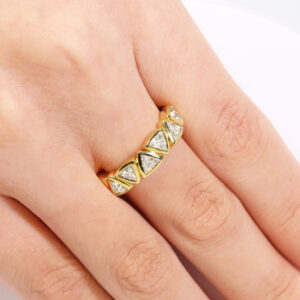 18ct yellow gold trilliant cut diamond bezel set ring