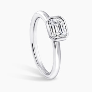 18ct white gold emerald cut bezel set diamond solitaire ring