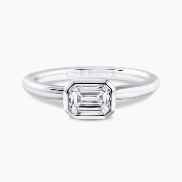 18ct white gold emerald cut bezel set diamond solitaire ring