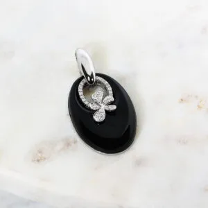 18ct white gold onyx and diamond pendant