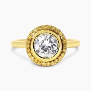 18ct yellow gold round bezel diamond ring with yellow diamond halo
