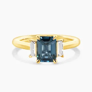 18ct yellow gold emerald cut london blue topaz and diamond ring