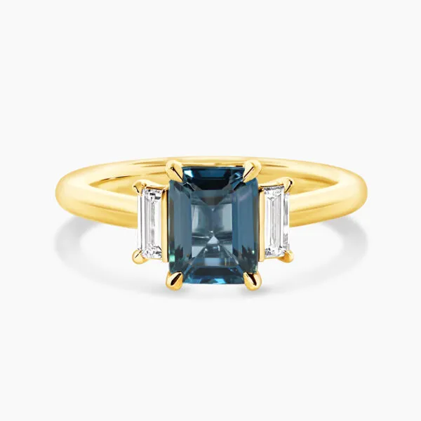 18ct yellow gold emerald cut london blue topaz and diamond ring