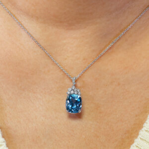 18ct white gold topaz and diamond necklace