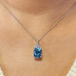 18ct white gold topaz and diamond necklace