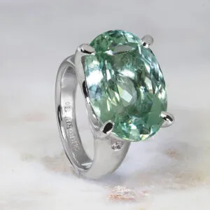 18ct white gold 16.46ct oval prasiolite and diamond ring