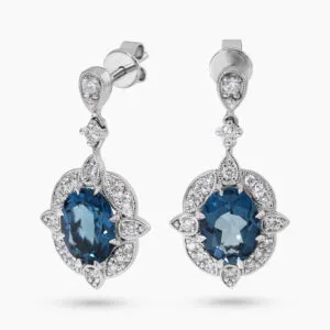 18ct white gold oval London blue topaz and diamond drop earrings