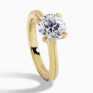 18ct yellow gold round brilliant cut diamond solitaire ring in a four claw setting